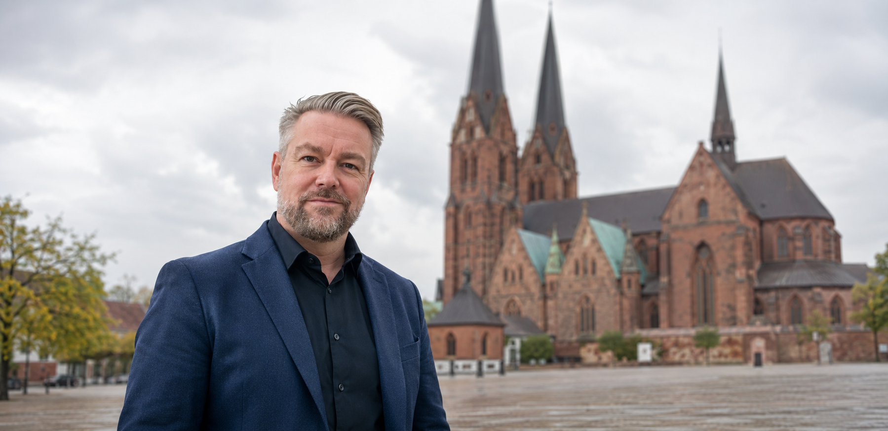 Claus Dietz foran Roskilde Domkirke som ledelsescoach i Roskilde
